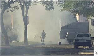 Protester surrounded by haze of tear gas
