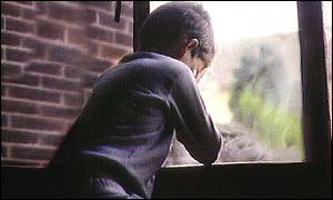 Child abuse victim in window