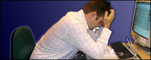 Man slumped over keyboard