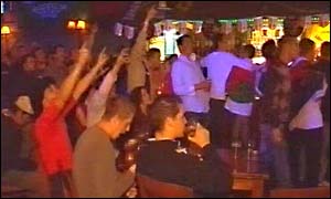 Wales fans salute