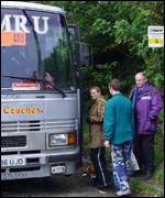 Passengers boarding a replacement bus 