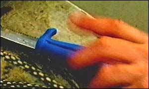 Hand and knife