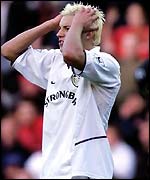 Alan Smith reacts to being sent off at The Riverside 