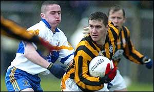 Crfossmaglen's John McEntee (right) won an All-Ireland medal with Armagh this year
