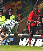 Joos Valgaeren (left) and Dwight Yorke