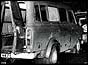 Back view of bullet riddled minibus