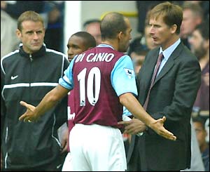 Paolo Di Canio argues with his manager during defeat at Tottenham