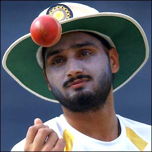 Indian spinner Harbhajan Singh tosses the ball to himself during practice ahead of the Irani Trophy 