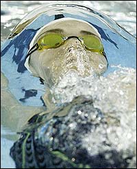 Giaan Rooney of Victoria on her way to winning the women's 50m backstroke final, during day three of the 2003 Telstra Australian Short Course Championships