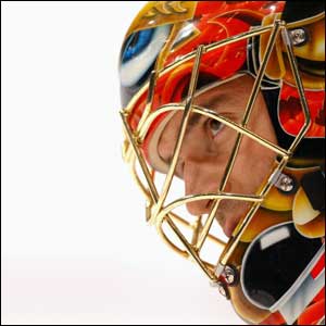 Ottawa Senators' Patrick Lamine keeps an eye on an opponent