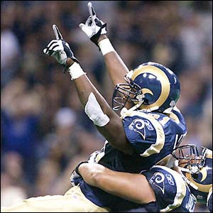 St Louis Rams' Leonard Little celebrates after sacking Doug Johnson of the Atlanta Falcons during the Rams' crushing 36-0 victory