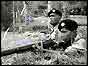 Soldiers guarding rubber plantation