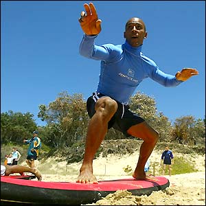 George Gregan takes some time out to learn surfing skills