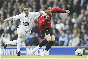 Gary Kelly tussles with Man Utd's Ronaldo