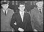 Albert DeSalvo flanked by two policeman