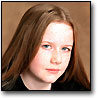 Lyra Belacqua, as played by Lulu Popplewell.