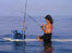 fishing on a longboard
