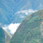 Denis' travelling party at the 'Sun Gate,' ready to make the final leg of the journey to Machu Picchu