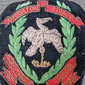 Norman's badge