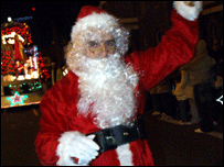 Father Christmas walking with the parade.