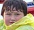 Bachgen yn y glaw