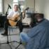 Keith Christmas plays guitar.