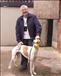 Tommy inspecting a greyhound owned by his brother John. (The dog's name is Lansdowne Aoife, "one to watch for" says Tommy)