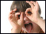 A cheeky child pulling a funny face