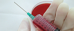 Syringe with blood
