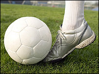 Kicking a football