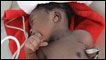 A baby in the Isaie Jeanty Hospital in Port au Prince, Haiti