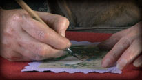 Glue the scenery onto the back panel