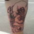 Afro man tattoo