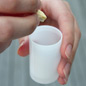 dropping the effervescent tablet into the cannister