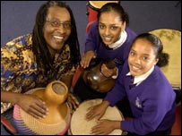 Eugene Skeef, Zulu drummer with two schoolgirls