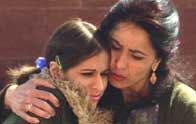 Hana comforts Jamillah after she crashed into the taxi.