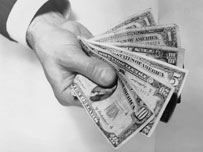 Hand holding money