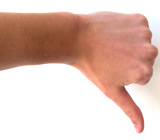 Hand in a thumbs-down gesture