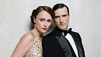 Lady Agnes Holland (Keeley Hawes) and Sir Hallam Holland (Ed Stoppard) open the doors to 165 Eaton Place