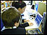 Students work on reports