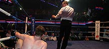 Sid sends Dugan to the canvas