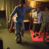 In their fancy dressing room, Jason likes to relax on his unicycle.