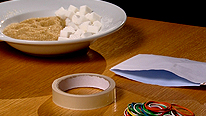 Things you can crush/rip/stretch to make triboluminescence (sugar, rubber bands, envelopes and tape)