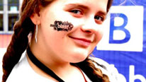 girl with Blast logo on cheek