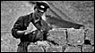 Workman buidling the Berlin wall