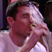 Manu throwing a drink over Scott