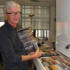 We run a tight ship here, so Paul mucked in and helped out by filing away some CDs.