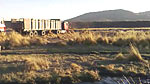 The team are stuck crossing a river in the Andes.