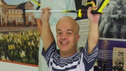 Tom lifting weights as part of his rehab