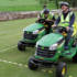 It's a nail-biting dash to the finish line as Dave beats Greg in the Lawnmower Racing final!